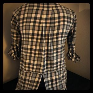 Women’s plaid flannel top.